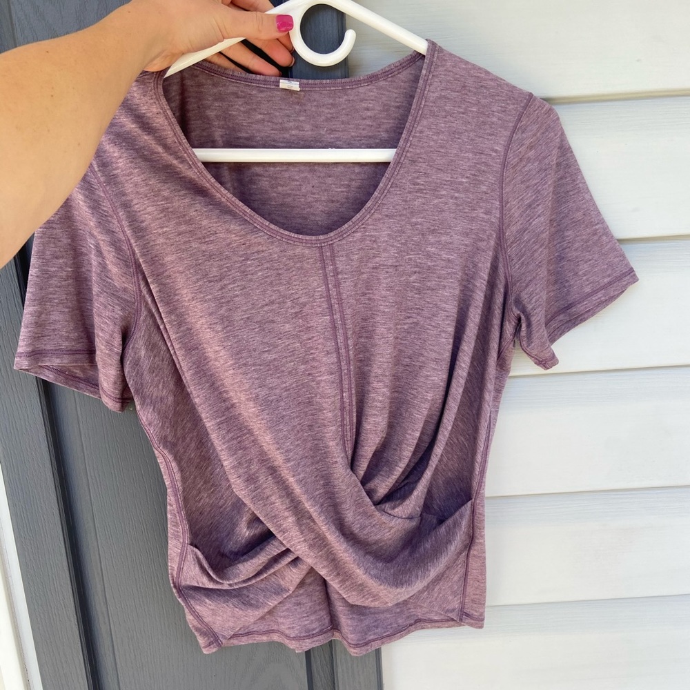 Lululemon criss cross top size 6. Worn maybe twice. In basically new condition.